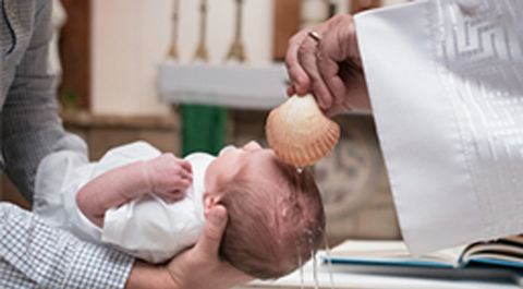 Baby being baptised