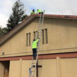 Roofers at work