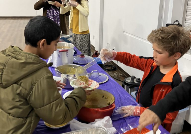 Boy serving soup