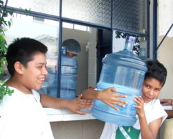 St-Joseph-Church-Sister-Parish-two-boys-with-water